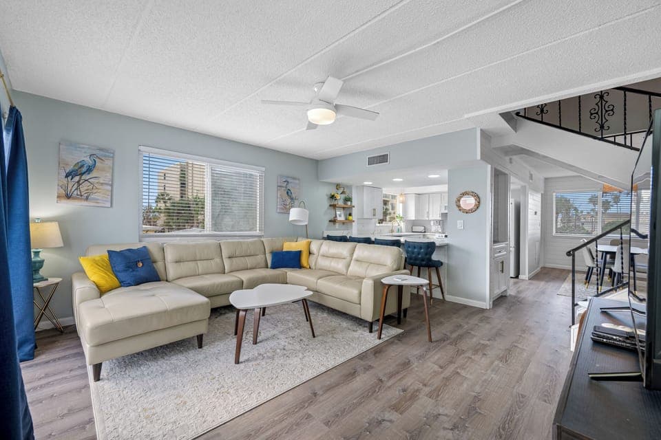 Spacious living room with comfy furniture.