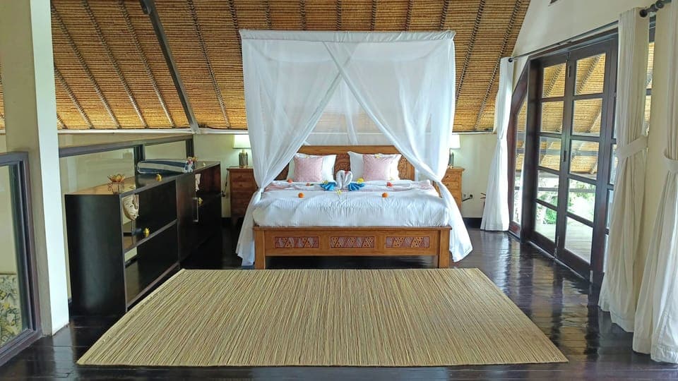 Bedroom 4 with a king bed, located upstairs