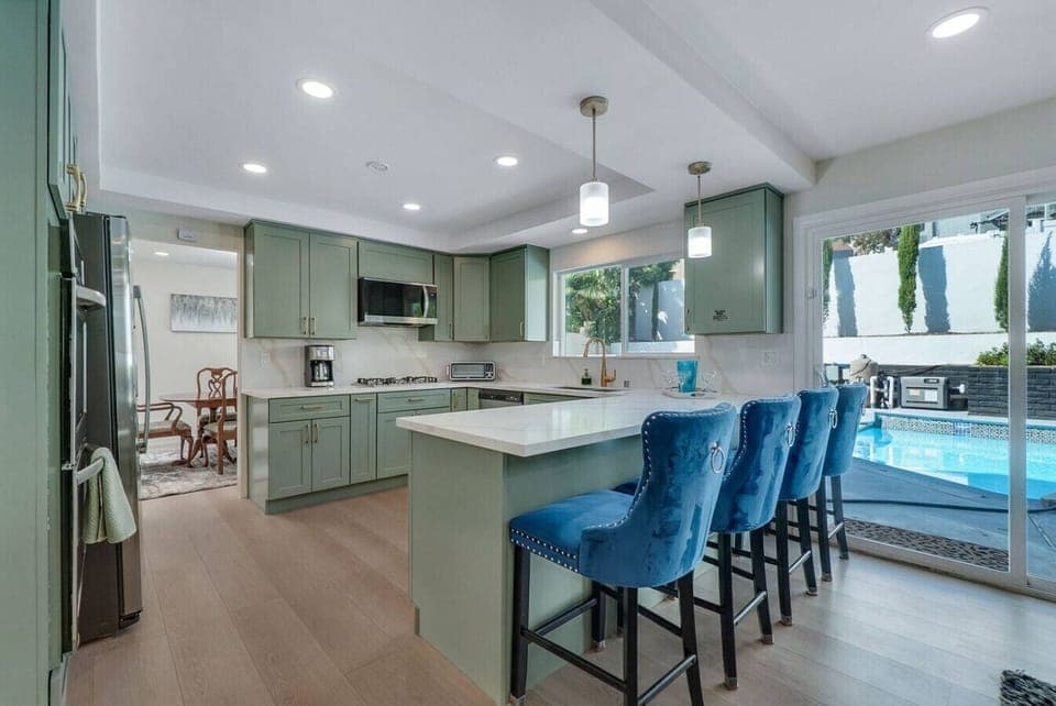 Updated kitchen with breakfast bar and stainless appliances.