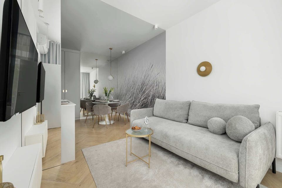 The living room's minimalist decor that enhances its elegant and modern feel.