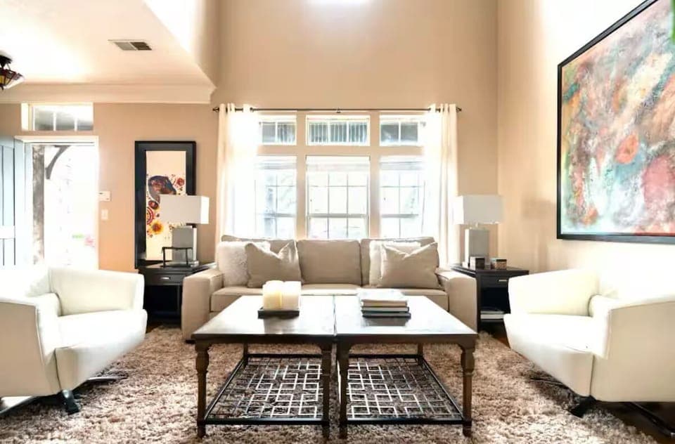 From front door to the Living Room with Vaulted 2-story ceiling.  New windows.