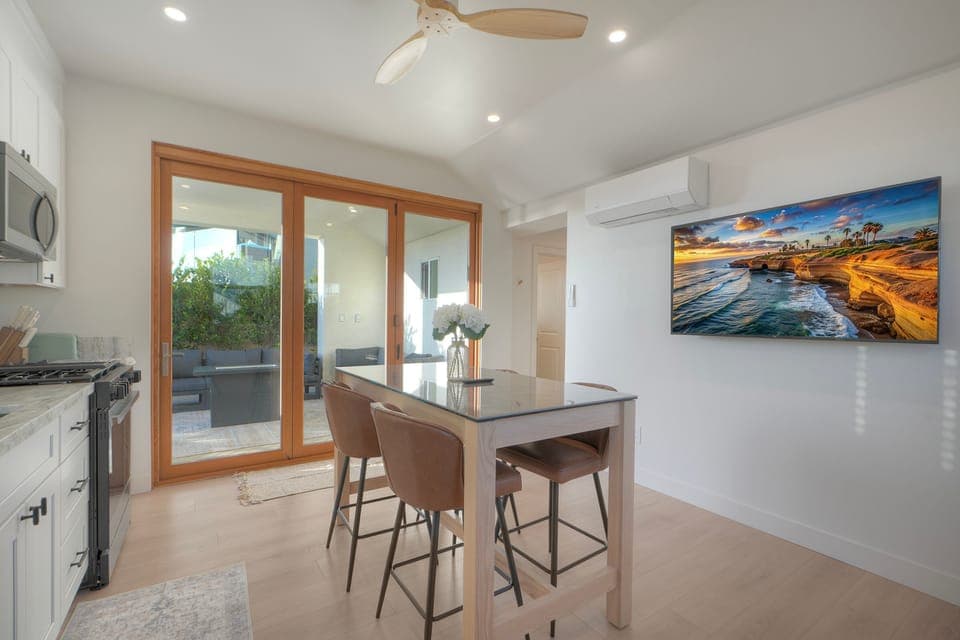 Open kitchen dining steps from outdoor lounge