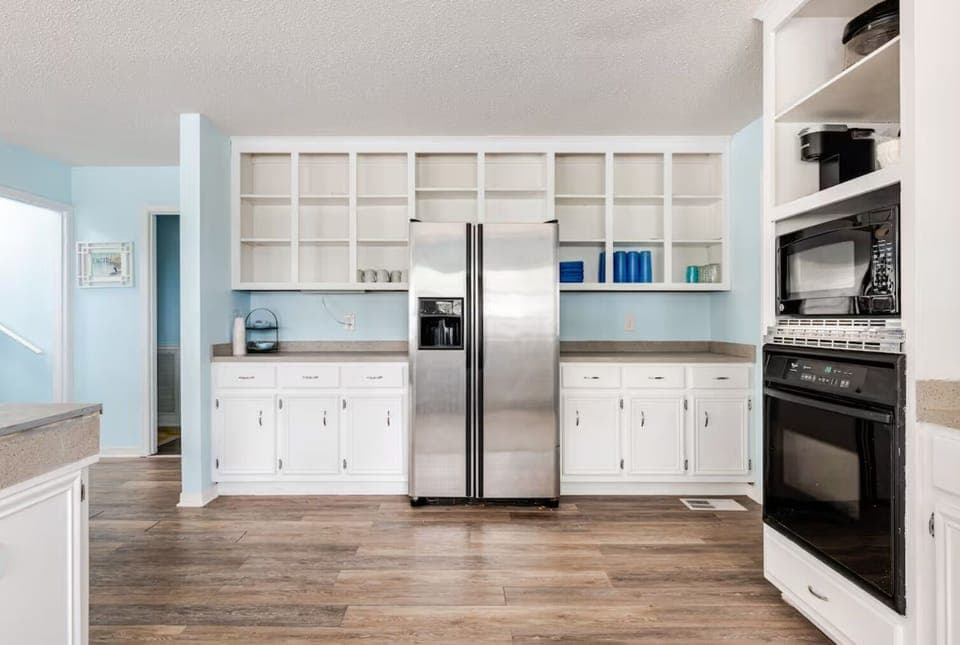 Spacious kitchen and dining area perfect for cooking and sharing meals together.