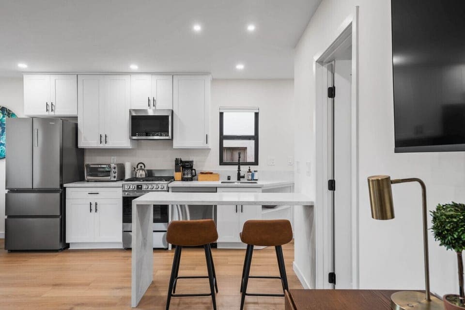 Gorgeously remodeled kitchen and dining area with plenty of space to cook and enjoy meals