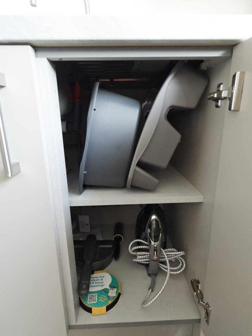 washing bowl and dryer under the sink to help you clean up.