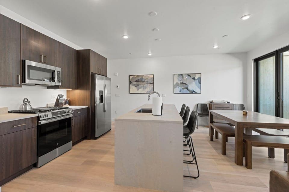 Fully stocked gourmet kitchen with new appliances.