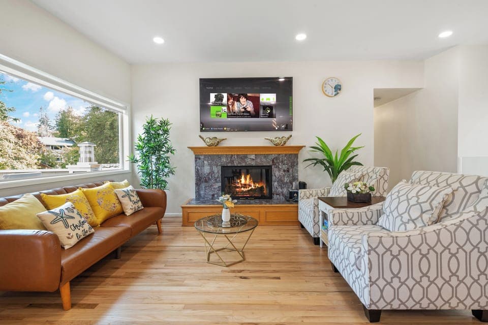 Bright living room with yellow accents and balcony for cozy relaxation