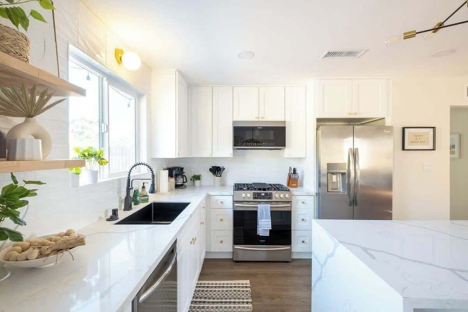 Cook up all your favorites in the gourmet kitchen with sleek quartz countertops