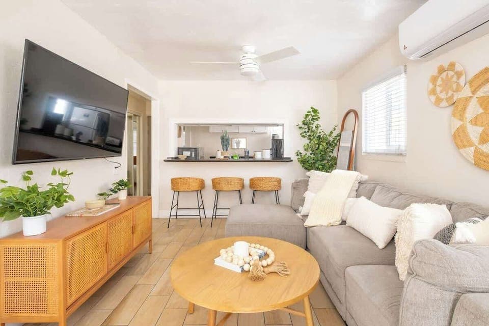 Call this stylish, cozy and inviting townhouse your home just steps from the beach!