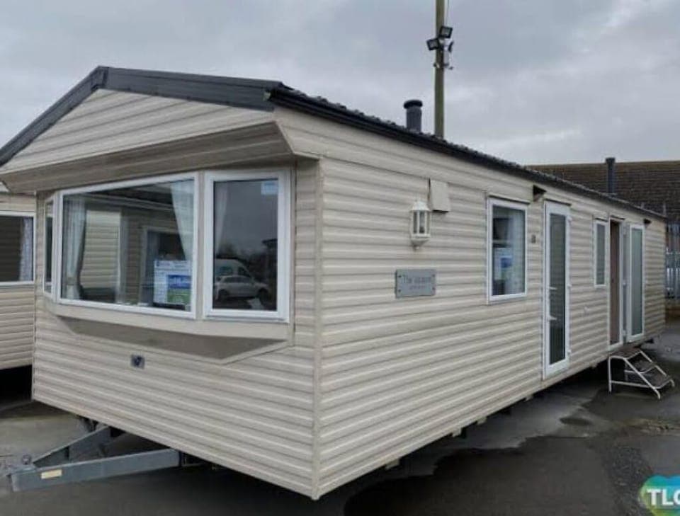 Cozy exterior of a charming, modern mobile home retreat