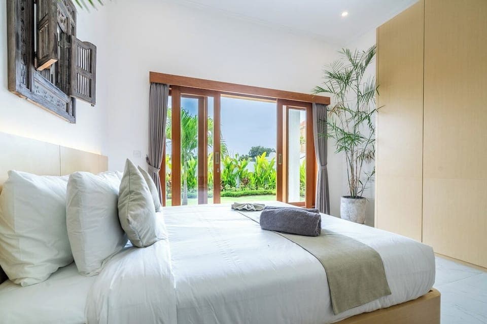 Discover a touch of elegance at Villa Tambora with our uniquely styled bed decor—a seamless blend of comfort and artistry that creates a welcoming ambiance for your stay. #Villa Tambora