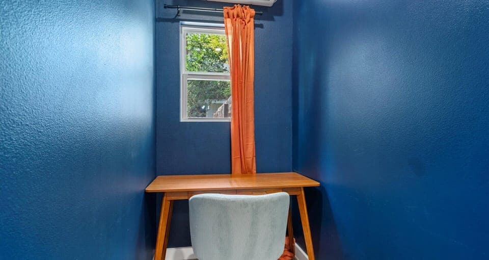 Productivity desk area in twin double bedroom