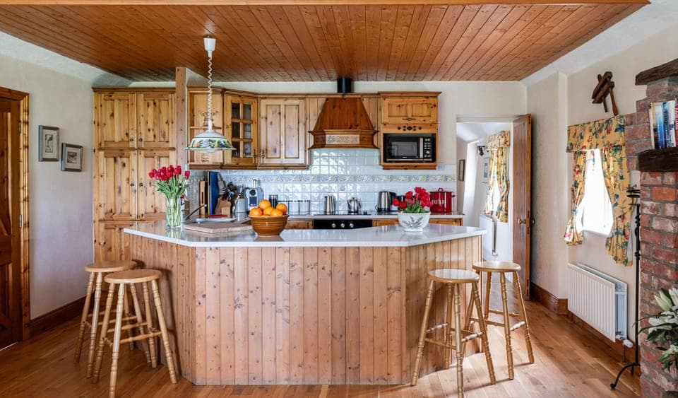 Open plan, farm house style galley kitchen, very well equipped for your holiday.