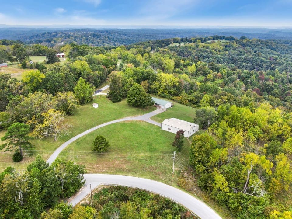 Spend time outside in the serene tree-filled acreage!