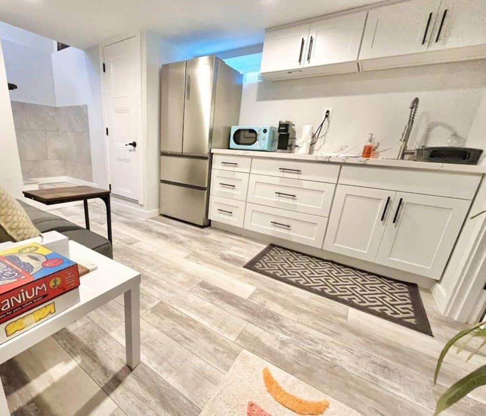 This bright kitchenette with a full fridge and coffee station gives you the freedom to fuel up for the day without ever leaving the comfort of your suite