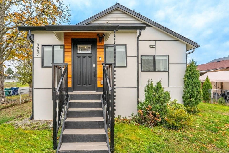 Ascend the steps to this modern, bright, and perfectly-sized retreat, where sleek design meets a warm, welcoming atmosphere ready for your next chapter.