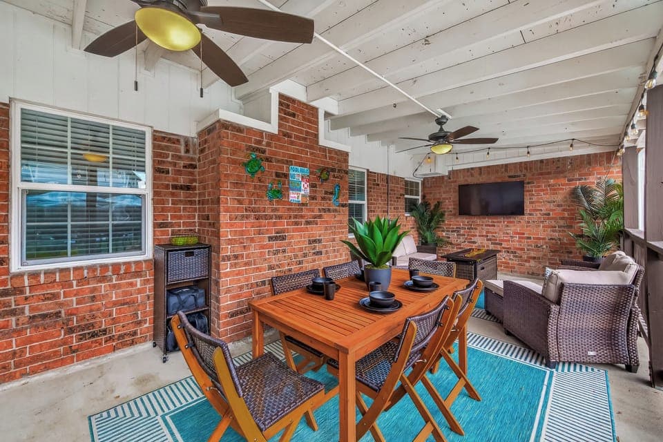 Outdoor Dining Area: Savor meals under the fans, surrounded by vibrant decor and relaxing vibes!