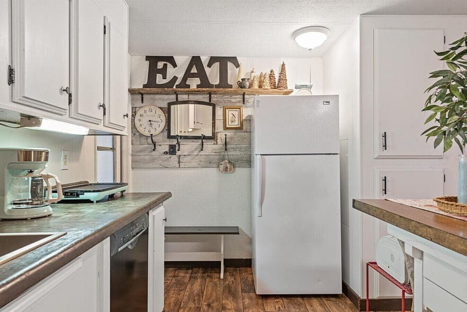 You will love the kitchen space with curated decor.