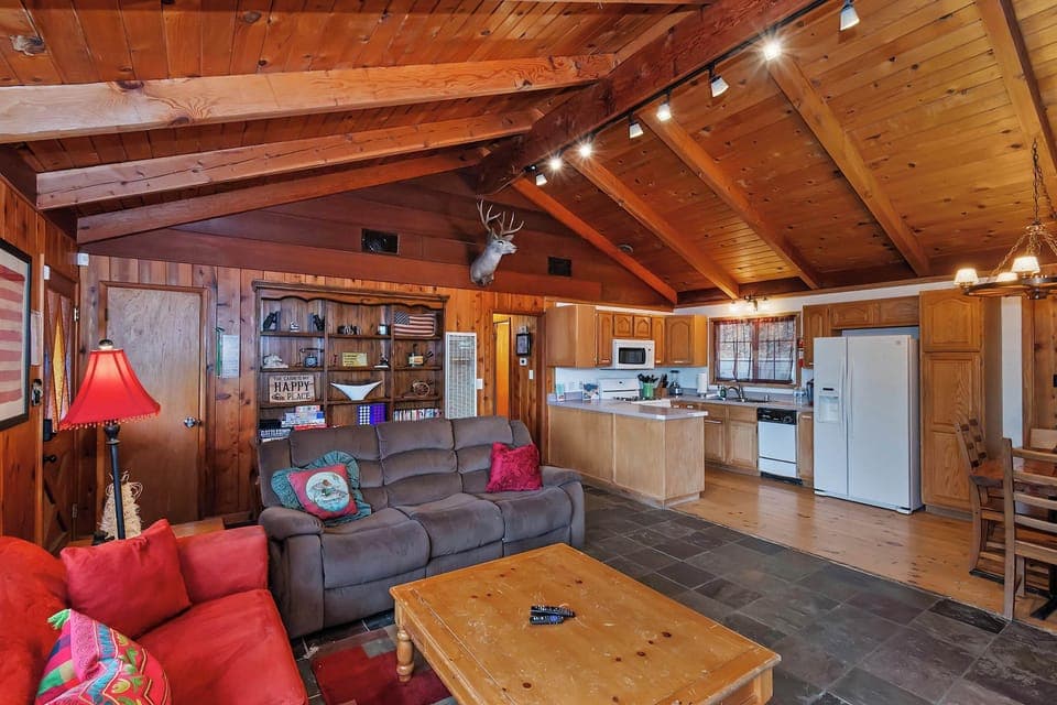 Open-concept living—queen sleeper, fireplace, and stunning views! 