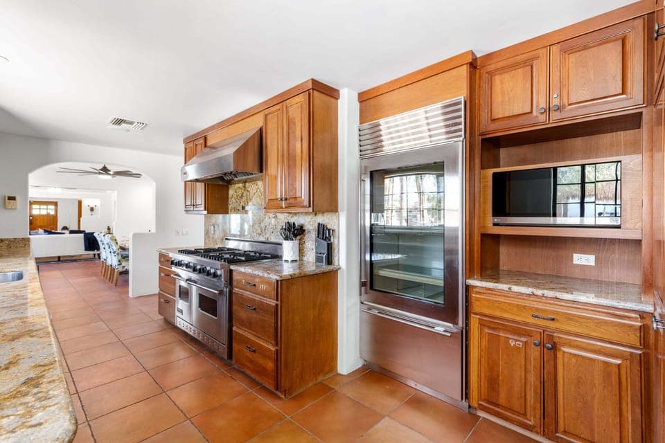 Chef's kitchen with modern stainless steel appliances