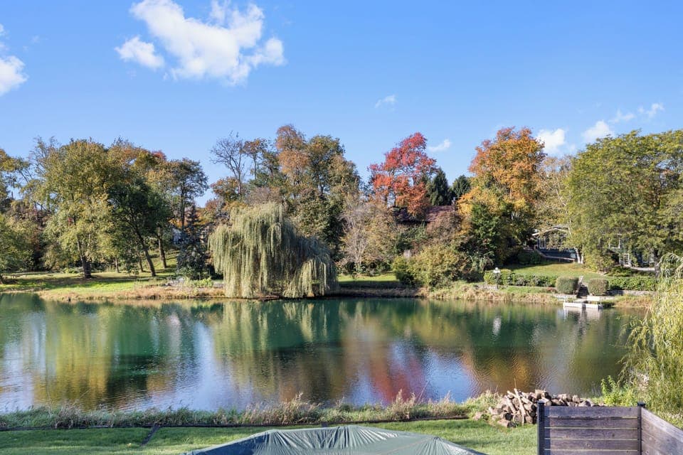 Enjoy peaceful water views right from the backyard. Seasonal pool and pond are swim at your own risk. 