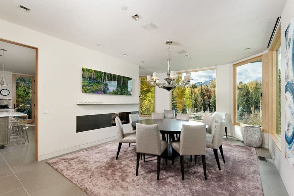 Formal Dining Room with Fireplace & Mountain Views
