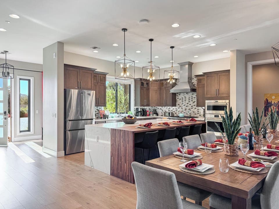 The entrance opens up to the kitchen and dining area.