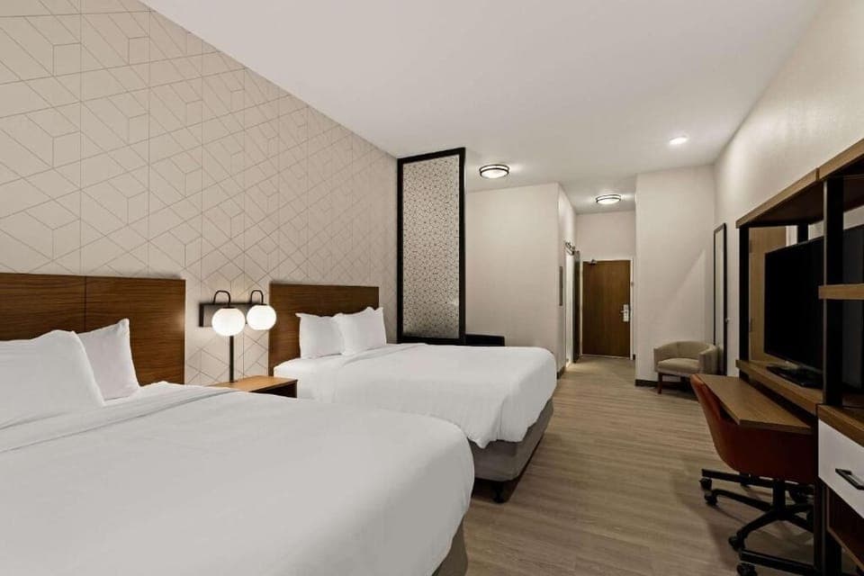 Stretch out with two plush beds in a bright, airy room.