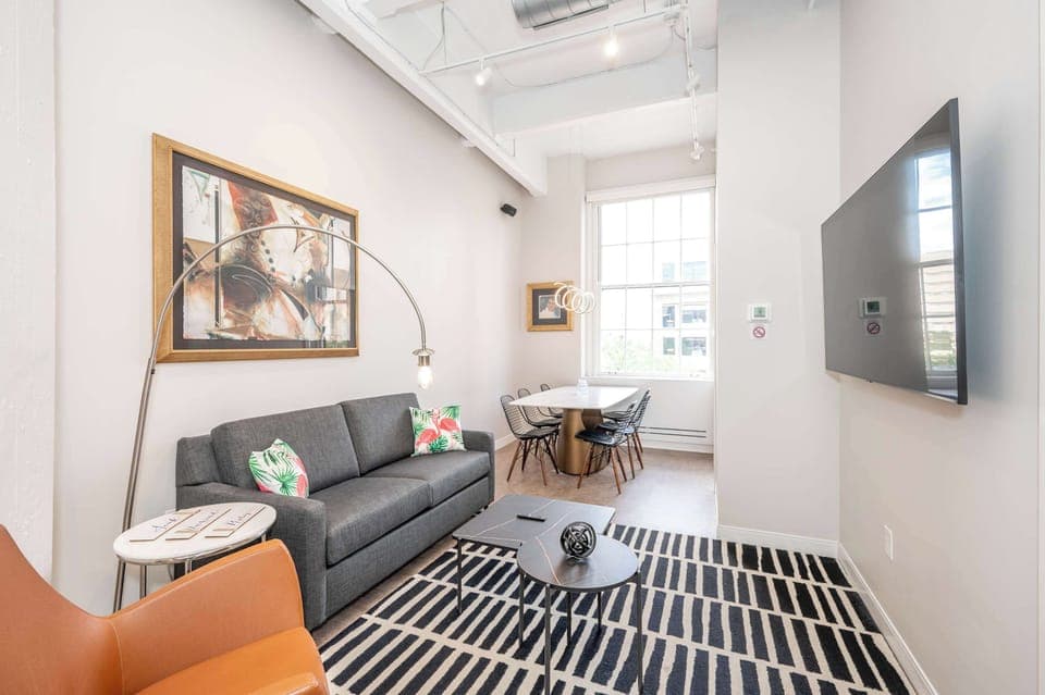 Unwind in the stylish living room & stream your favorites on the smart TV​