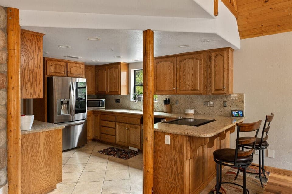 Warm wood kitchen with modern touches.
