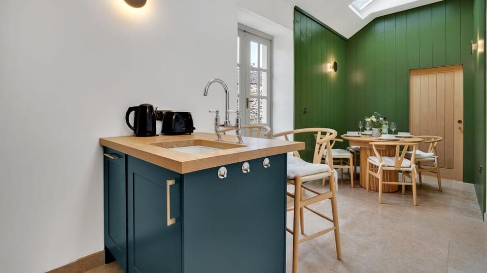 Whether you just have a quick breakfast at the bar or a more formal sit down meal together this is a light and bright room.