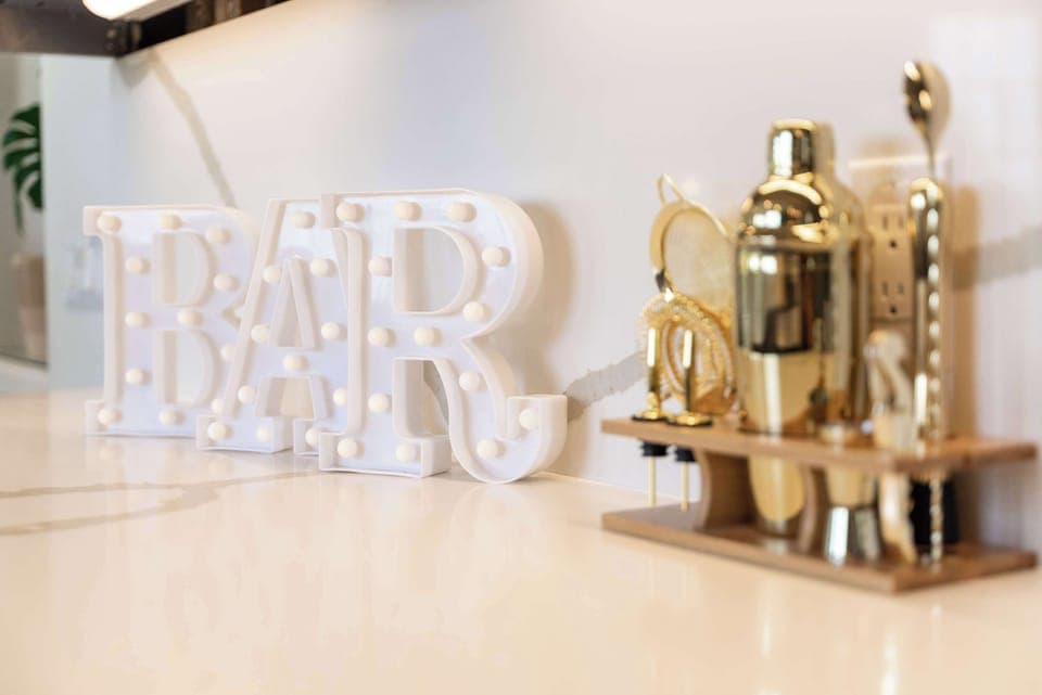 Welcome to your own little corner of cocktail heaven! Whether you’re shaking up martinis, pouring a perfect mocktail or just toasting to vacation vibes, our mini bar has you covered. Cheers to chill nights, good company, and questionable dance moves!