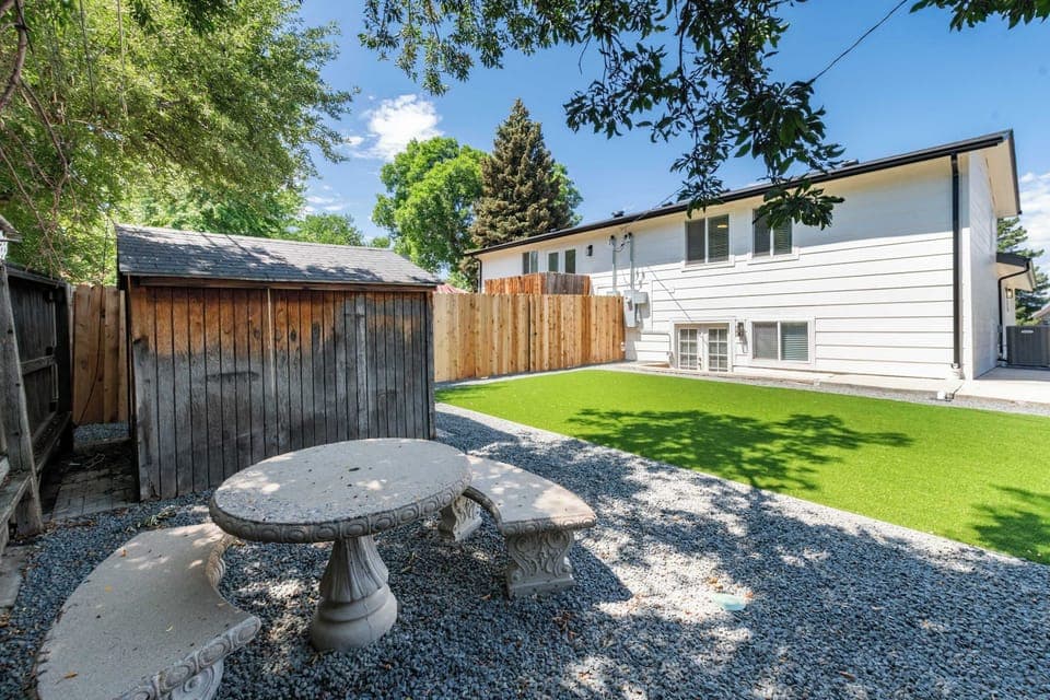 Expansive backyard with green turf and open space to unwind.