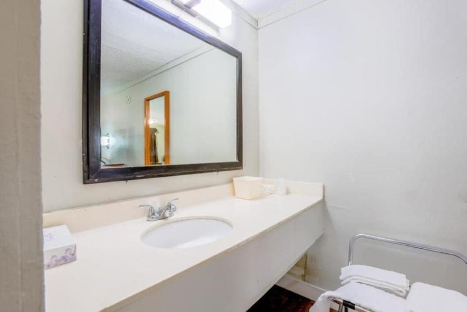 Get ready fast with a wide vanity and bright mirror.