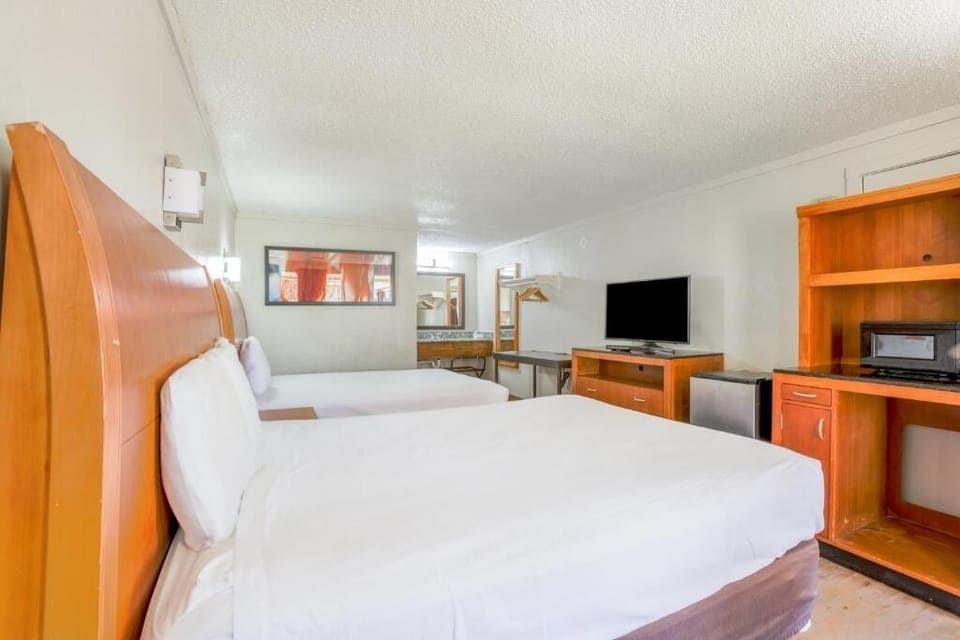 Stretch out on crisp linens in a roomy double-bed setup.