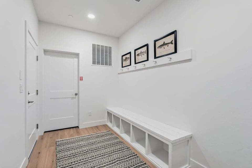 Your private mudroom offers built-in storage and hooks to keep your belongings organized during your stay.