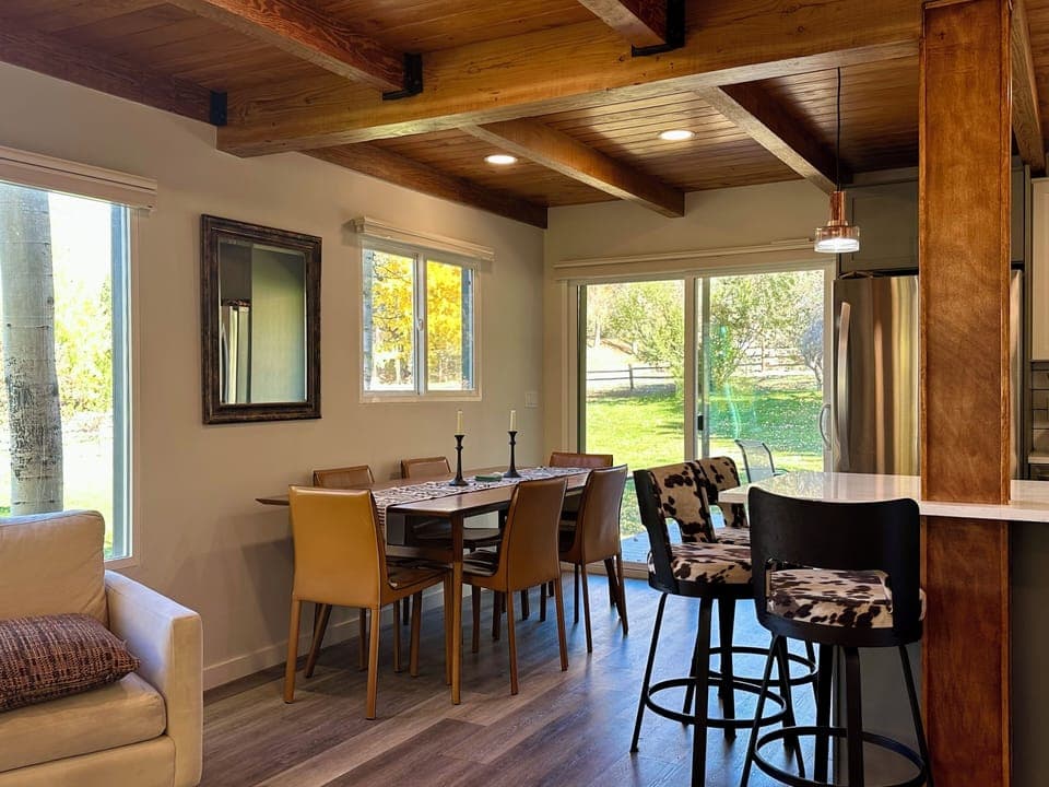 Dining area beside the kitchen, with easy access to the deck and outdoor views