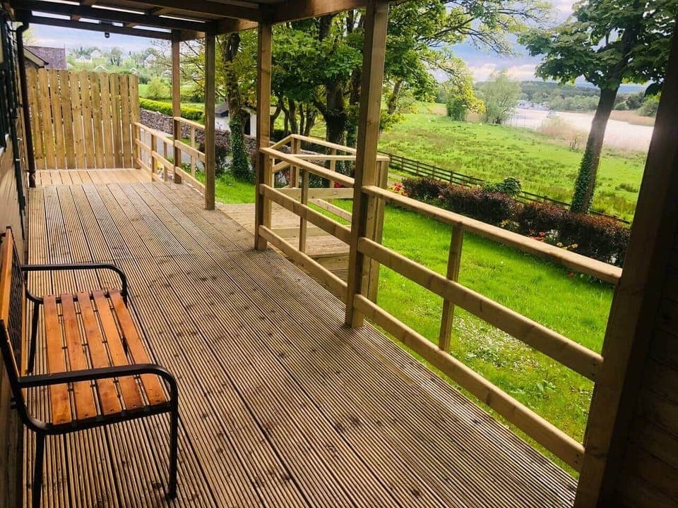 Relax on your porch and watch the boats and swans go by
