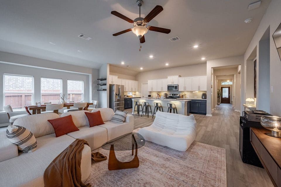 Enjoy a seamless flow from kitchen to lounge — perfect for family gatherings or movie nights.