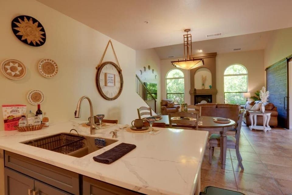Open view of entire first floor living area.  Kitchen, dining area, and living room view. 