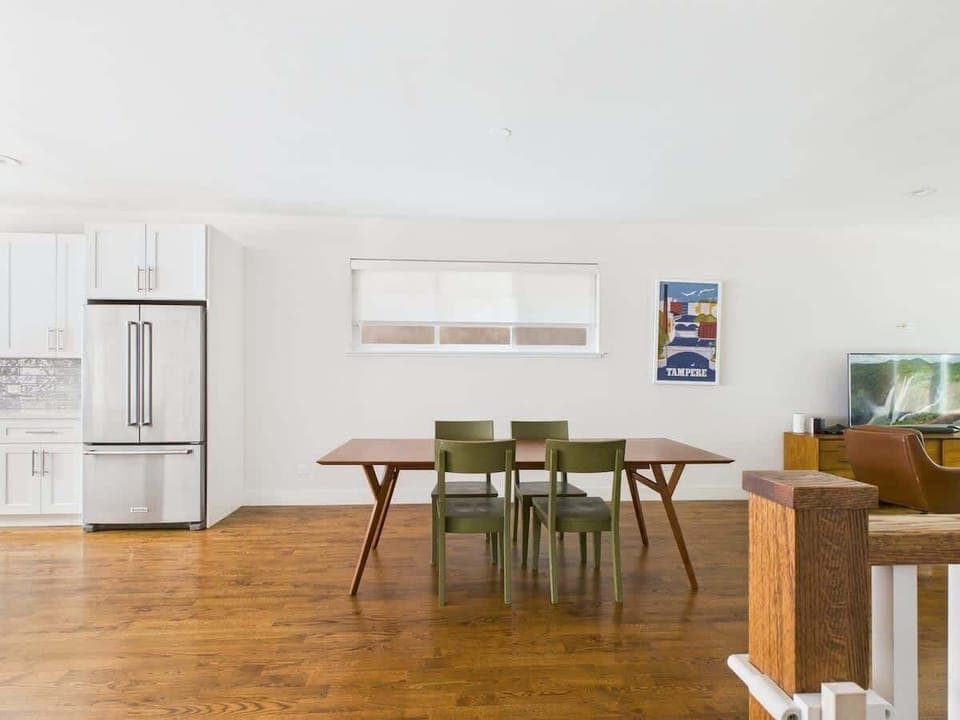 Open dining area connecting seamlessly to the kitchen and living room — perfect for shared meals and easy conversation.