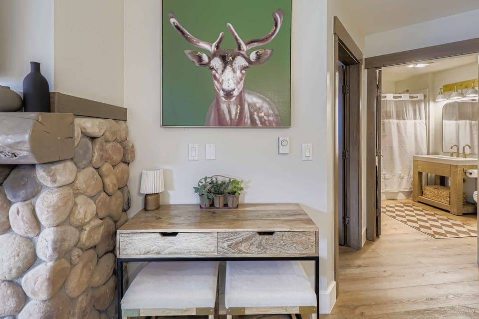 Small desk by the fireplace for the perfect spot to work