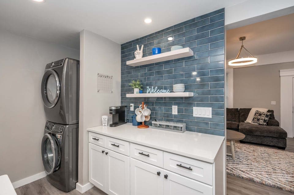 The chic, open kitchen offers ample space & all the comforts of home​