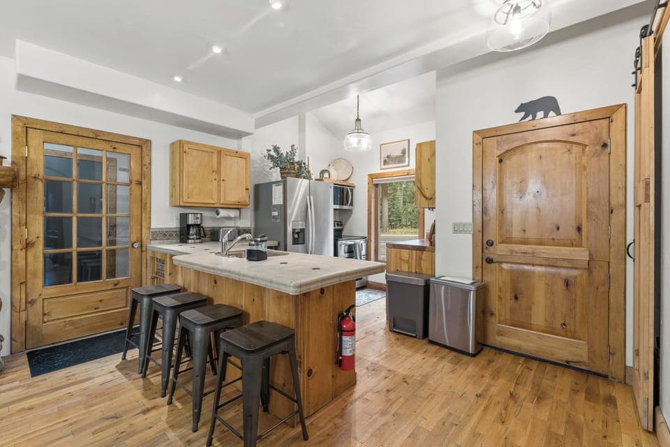 The open concept kitchen is excellent for preparing meals for friends and family. 