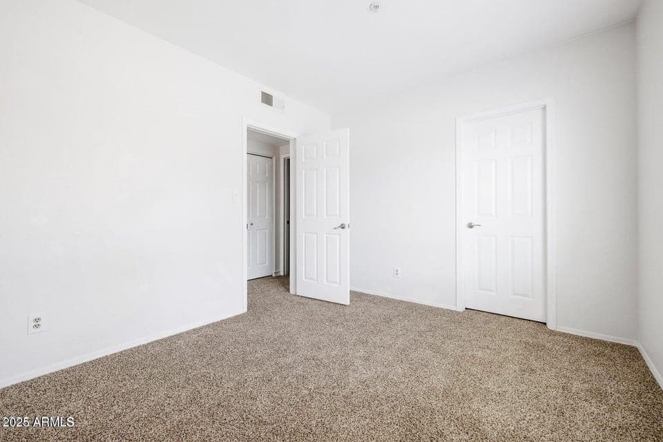 bedroom has a queen size bed and dresser - photos coming soon 