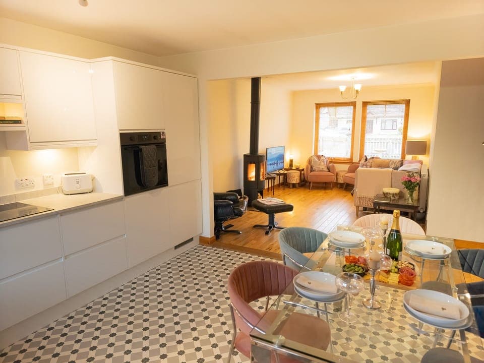 Open-plan living and dining area Aviemore holiday home