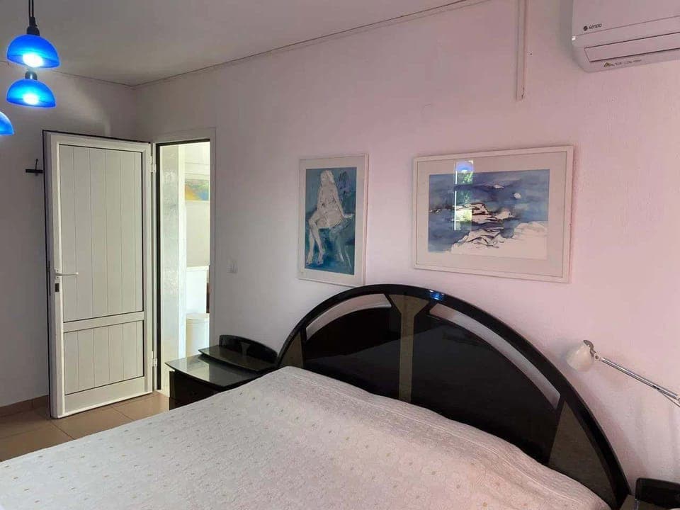 Elegant, cozy space with plush bedding and air conditioning — your private retreat after a day by the water.