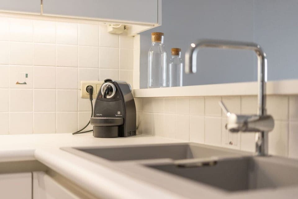 Kitchen with kitchen utensils and utilities