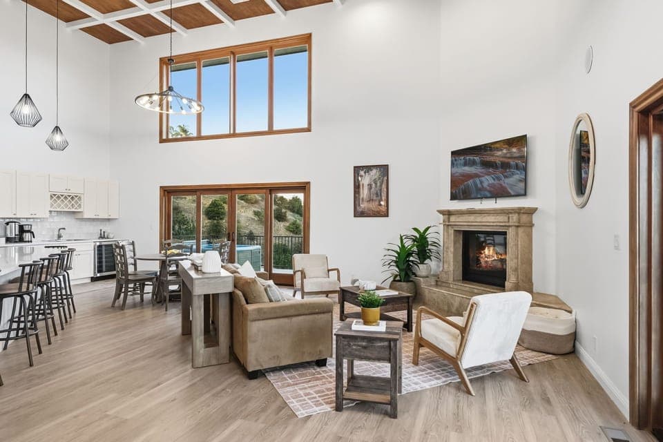 The expansive living space boasts stunning mountain views from every direction. 