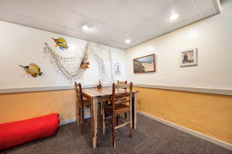 High top table with seating for 4 in the bonus room, great for card games or some wine tasting